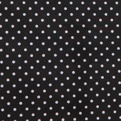 Swatch of fun and classic, bright polka dots in white on polycotton fabric in black
