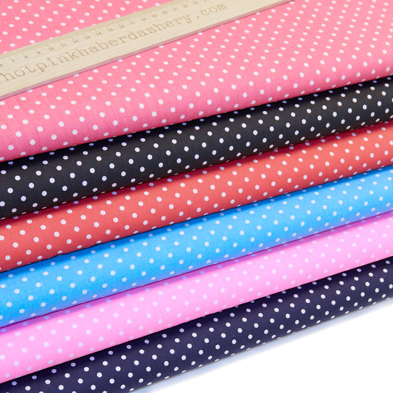 Fun and classic, bright polka dots in white on polycotton fabric in Black, Navy, Red, Neon Pink, Turquoise & Pink