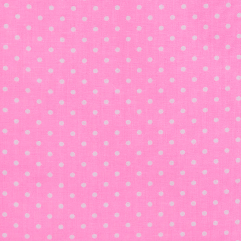 Swatch of fun and classic, bright polka dots in white on polycotton fabric in neon pink