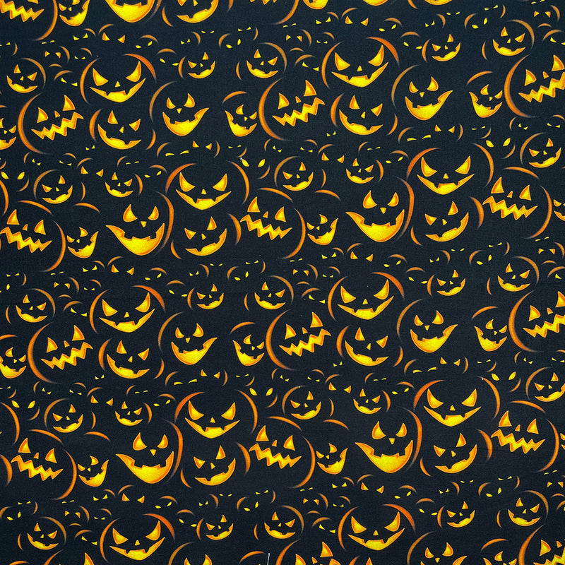 Swatch of Jack o lantern pumpkin Halloween fabric 100% cotton by Chatham Glyn