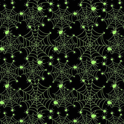 Swatch of Glowing spider webs 100% cotton Halloween fabric by Chatham Glyn