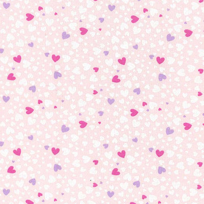 Swatch of Scattered heart print jersey fabric by John Louden in pink