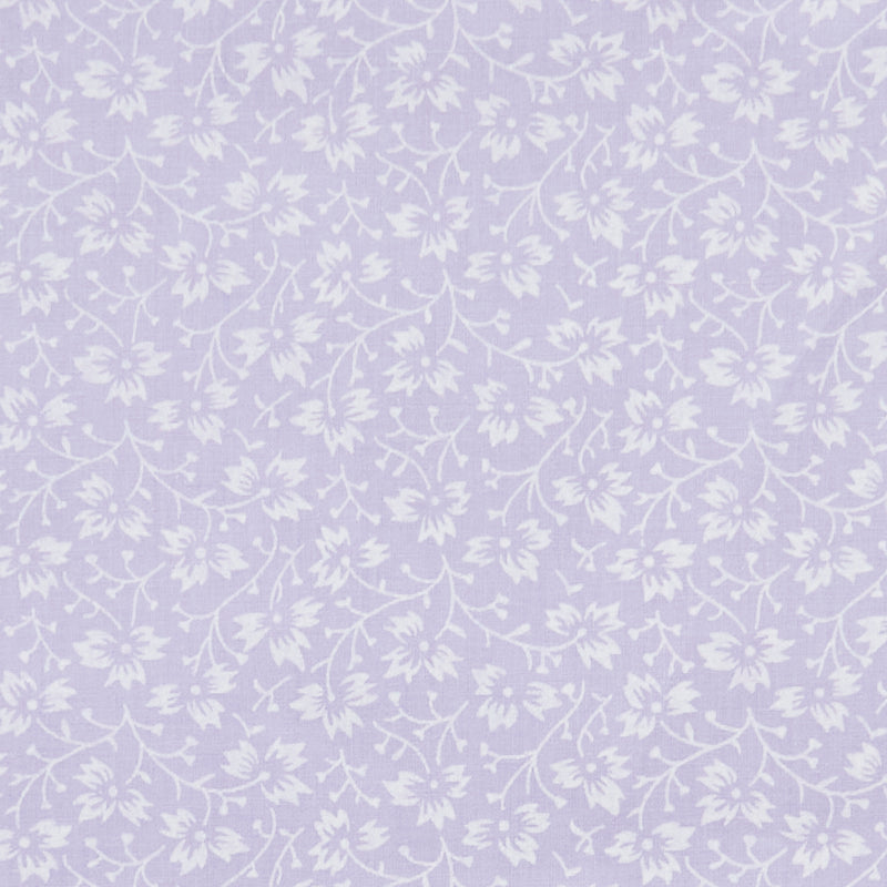 Swatch of elegant, swirling white flowers on pastel polycotton fabric in lilac