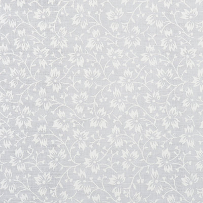 Swatch of elegant, swirling white flowers on pastel polycotton fabric in white
