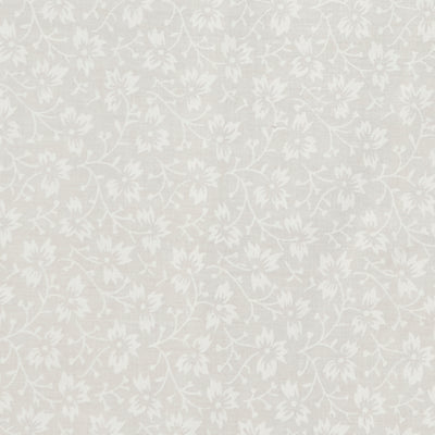 Swatch of elegant, swirling white flowers on pastel polycotton fabric in ivory