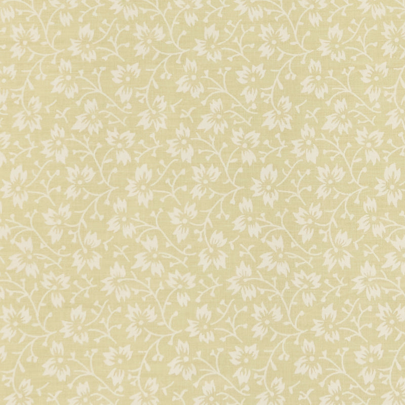 Swatch of elegant, swirling white flowers on pastel polycotton fabric in lemon yellow