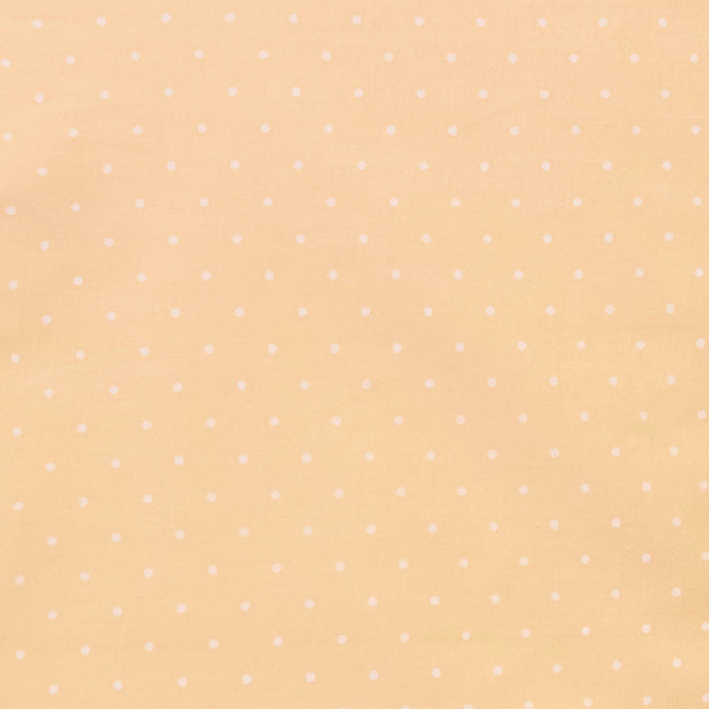Swatch of small classic polka dot printed polycotton fabric in pastels in orange