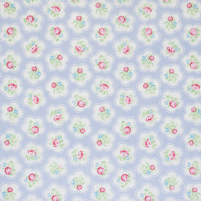 Swatch of Dainty floral rose 100% cotton fabric by Chatham Glyn in powder blue