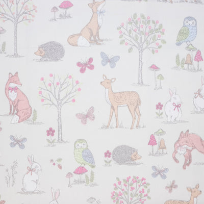 Swatch of woodland animal fabric in 100% cotton by Chatham Glyn in cream