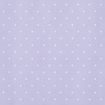 Swatch of small classic polka dot printed polycotton fabric in pastels in lilac.