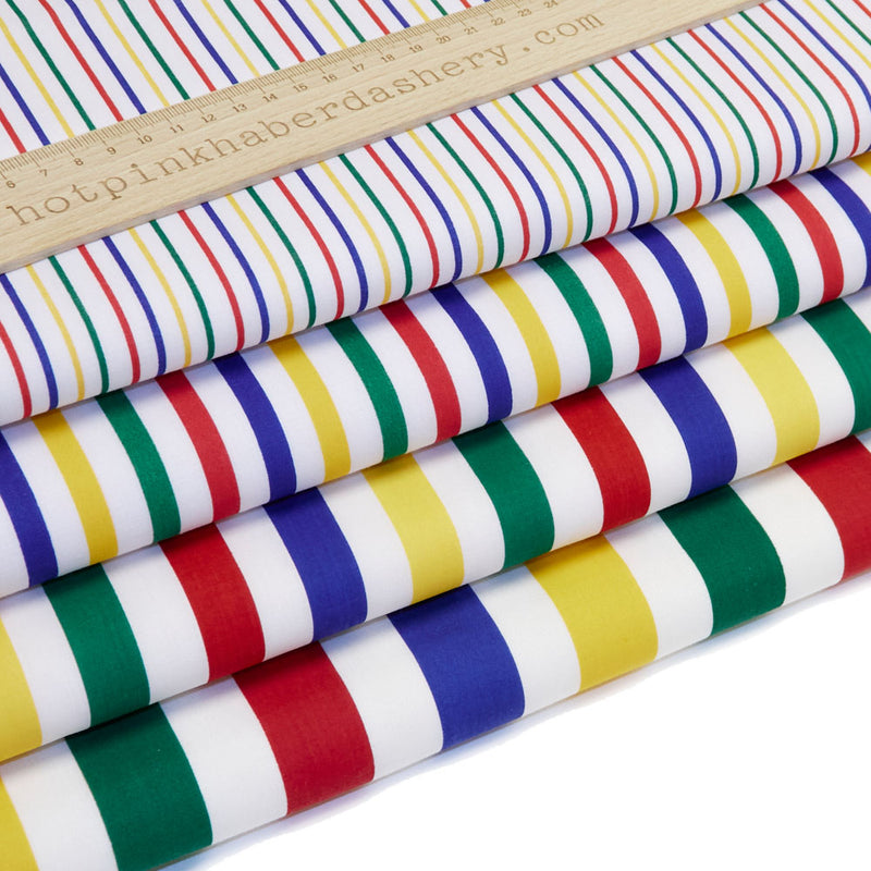 Classic, bold seaside bright stripes on polycotton fabric in red, yellow, green and blue on white in Narrow, Medium, Wide & Extra Wide stripe.