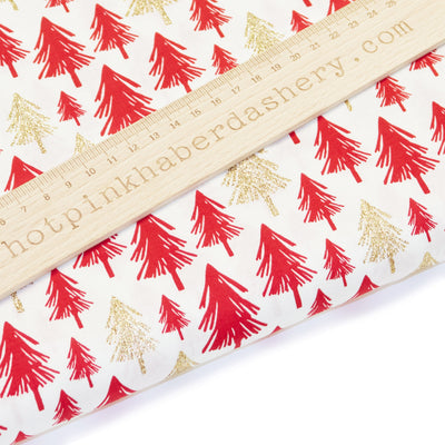 Rose & Hubble 100% cotton poplin fabric with elegant gold glitter and red Christmas trees on ivory background