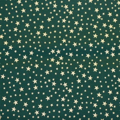 Swatch of elegant Christmas gold sparkly stars printed 100% cotton poplin fabric by Rose and Hubble in Green