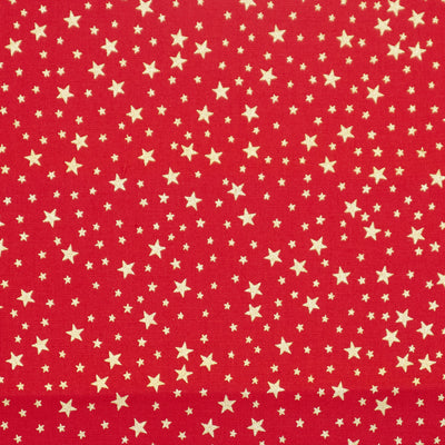 Swatch of elegant Christmas gold sparkly stars printed 100% cotton poplin fabric by Rose and Hubble in Red