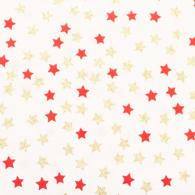 Swatch of Christmas glitter gold stars on ivory in 100% cotton poplin fabric by Rose and Hubble