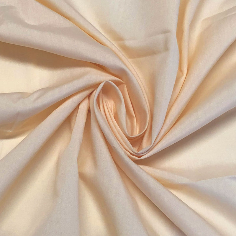 Plain polycotton fabric swatch in pale peach 32