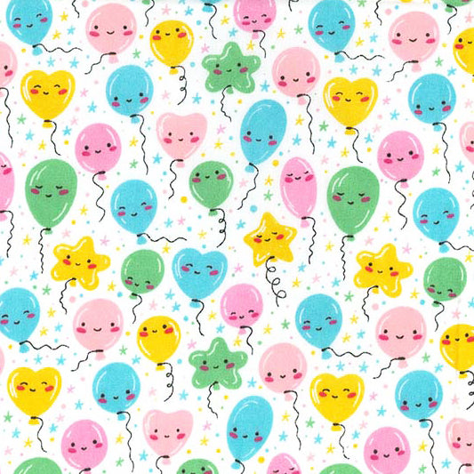 Swatch of smiley balloons polycotton fabric