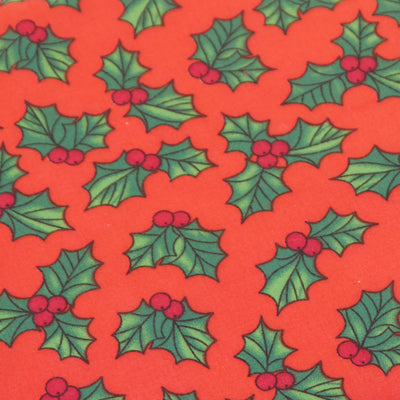 Christmas Holly on Red polycotton fabric