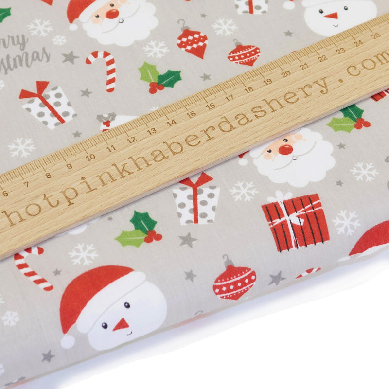 Christmas Santa & snowman faces on grey polycotton fabric