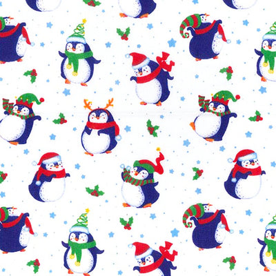 Swatch of Christmas penguin polycotton fabric