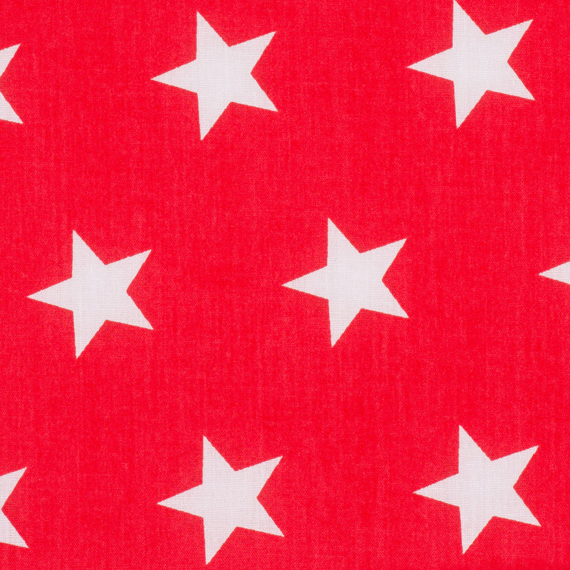 Swatch of fun and bold white stars on polycotton fabric in red